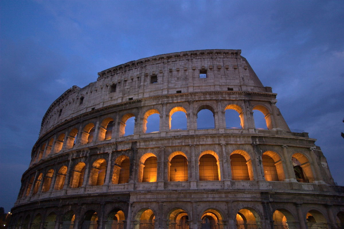 A picture of the Colosseum in Rome from the outside. In this case, the picture is symbolic of committing to something 100%: of being the "man in the arena."